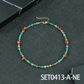 Handgemaakte kralenketting met groene en rode stenen, goudkleurige kralen en verlengketting - Groene Aventurijn En Rhodoniet Ketting