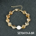 Elegant beaded bracelet with gold faceted beads and a white pearl charm for women - Citrine Bracelet