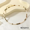 Handmade necklace with white pearls and dark green natural stones and golden clasp - Unakite