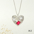 Macro shot of silver heart pendant with red and white zircon insets on box chain - Silver Dark Red Style (NE2259-A-2)