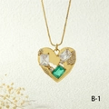 Macro detail of gold heart pendant necklace with green emerald-cut zircon and box chain - Gold Green Style (NE2259-B-1)