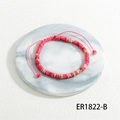Detail of bohemian woven bracelet with pink marble beads and gold metallic spacers - Peach Pink Marble Pattern Style (BR1822-B)