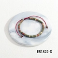 Detail view of woven beaded bracelet with semi-precious stones and adjustable red cord - Unakite Stone Style (BR1822-D)