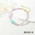 Detail view of macaron beaded bracelet with pastel semi-precious stones and gold clasp - Light Purple Discs Blue Main Bead (BR1831-B)