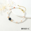 Detail showing the white square beads, pink accents, and gold clasp of the beaded bracelet - White Square Beads Blue Black Main Bead (BR1831-C)