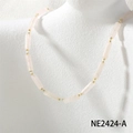 Close-up of handmade pink stone bead necklace with freshwater pearls and golden accents - Pink Crystal Style (NE2424-A)