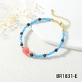 Detailed shot of sky blue square beads and pink accent bead on a beaded bracelet - Sky Blue Square Beads Pink Red Main Bead (BR1831-E)