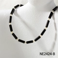 Detail of beaded necklace featuring black cylindrical beads and gold metallic accents - Black Agate Style (NE2424-B)