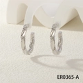 Macro view of silver-tone C-shaped hoop earrings with intricate twisted rope texture - Twisted C-Shape Style (ER0365-A)