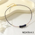 Delicate beaded choker necklace featuring dark pearls and dainty rice beads on a chic metal chain. - Dark and Pink Beaded Choker with Four Dark Pearls (NE2478-A-3)