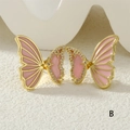 Detailed close-up of butterfly stud earrings with pink enamel and sparkling zircon pavé - Pink