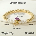 Halloween elastic bracelet with gold beads, white pearls and purple witch cat charm - Gold Witch Cat Style (BR2011-C)