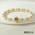 Beaded bracelet with white pearls, gold beads and an enamel flower skull charm - Colorful Floral Gold Skull Style (BR2013-A)