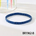 Detailed macro view of dark blue square Tila bead elastic bracelet on white background - Dark Blue (BR1962-B)