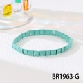 Detail of teal Tila bead bracelet with white marble texture on a soft white fabric - Cyan White Splatter (BR1963-G)