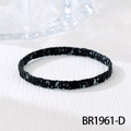 Close-up of black Tila bead bracelet with grey marble pattern on textured background - Black and Gray Splatter Style (BR1961-D)