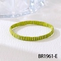 Macro detail of Bohemian glass Tila beads in grass green with natural spotted textures - Grass Green Splatter Style (BR1961-E)