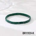 Detailed macro view of dark green flat glazed beads with brown speckles on elastic cord - Dark Green Speckled (BR1959-K)