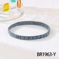 Detailed macro view of grey-blue Tila beads on an elastic Bohemian style bracelet - Blue Gray Brown Spotted (BR1963-Y)
