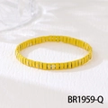 Detail of yellow cube bead bracelet with white dots on a clean white textured background - Yellow White Dotted (BR1959-Q)