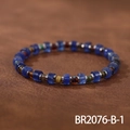 Close-up of handmade beaded bracelet with blue cylinder stones and vintage metal spacers - Blue Translucent Bohemian (BR2076-B-1)