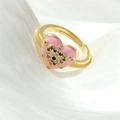 Macro view of gold heart ring with pink enamel, colored crystals and evil eye detail - Adjustable Open / Pink