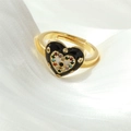 Macro shot of gold adjustable heart ring with evil eye enamel and colorful crystals - Adjustable Open / Black