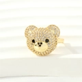 Detailed view of a gold teddy bear ring featuring micro-pave white zircon stones - Adjustable Open / Gold-White Zirconia