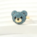 Close-up of teddy bear ring with blue micro-pave zircon crystals and golden metal details - Adjustable Open / Gold-Sky Blue Zirconia