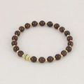 Tourmaline gemstone bracelet with deep red beads and golden hollow center charm - Pomegranate Red