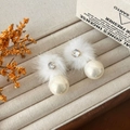Winter plush earrings with white faux fur pompom, crystal stud, and elegant pearl detail - White