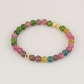 Multicolor natural stone beaded bracelet with gold metal accents and red inlay detail - Tourmaline (6mm)