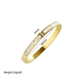 Bracelet ovale doré élégant avec incrustation de nacre et trois zircons, largeur 6mm - Bracelet Coquille Strass Doré