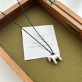 Artistic silver horse pendant necklace with minimalist design on black leather cord - Brushed Silver Horse Necklace