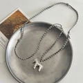 Handcrafted woven rope necklace with a minimalist silver horse pendant and tri-color cord - Silver Horse Braided Rope Necklace