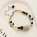 Chinesisches Retro-Perlenarmband mit gelben und grauen Marmorquadrat-Perlen für Damen - Gelbes Perlenarmband