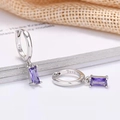 Macro shot of S925 sterling silver stamp and rectangular purple zircon stone on the earring - Platinum Plated Purple Zirconia