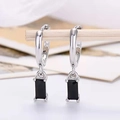 Detailed macro shot of S925 silver stamp on earring with rectangular black zircon drop - Platinum Plated Black Zirconia