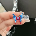 Detailed view of liquid butterfly ring with red and blue gradient drip oil on silver metal - Premium Butterfly Style 1 / Red & Blue Contrast (1#-C)