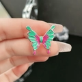 Close-up of butterfly ring with green and rose red enamel on a silver metal frame - Premium Butterfly Style 2 / Emerald Green & Rose Red (2#-C)