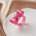 Funkelnder rosa Harzring mit Schleife und Glitzer, ideales Accessoire für Damen. - Dunkelrosa