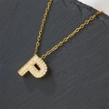 Luxury gold plated letter P pendant necklace with sparkling cubic zirconia on stone background - Letter P (Pendant Only)