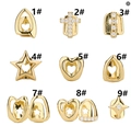 Detailed grid of 9 gold-plated hip hop tooth grills featuring star and heart cutouts - Hollow Heart Style (Style 1#) / Gold