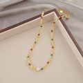 Beaded necklace with yellow stones, freshwater pearl and gold heart pendant detail - Natural Freshwater Pearl Necklace