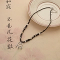 Etnische kralenketting met zilveren Ruyi-slot hanger en zwarte bamboe-vormige kralen - Veiligheidsslot Bel Ketting