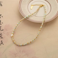 Etnische kralenketting met hemelsblauwe schijven, parels en gouden bedeltje - Shoushan Steen Kleurrijke Kralenketting