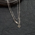 Collana a doppio strato in argento con pendente a stella, pietre nere e catena cubana - Collana Stella a Doppio Strato