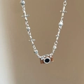 Vintage-Kamerakette in Braun mit Silberkette und schimmernden Zirkonia-Kristallen - Schleife und Kreuzstern Elemente / Silberne Schleifen Kamera Halskette