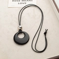 Minimalist black ring pendant sweater necklace with silver bead on adjustable wax cord - Black Agate Pendant Necklace