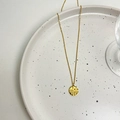 Chinese retro style gold Fu pendant necklace on a minimalist ceramic plate - Gold Lucky Plate Necklace